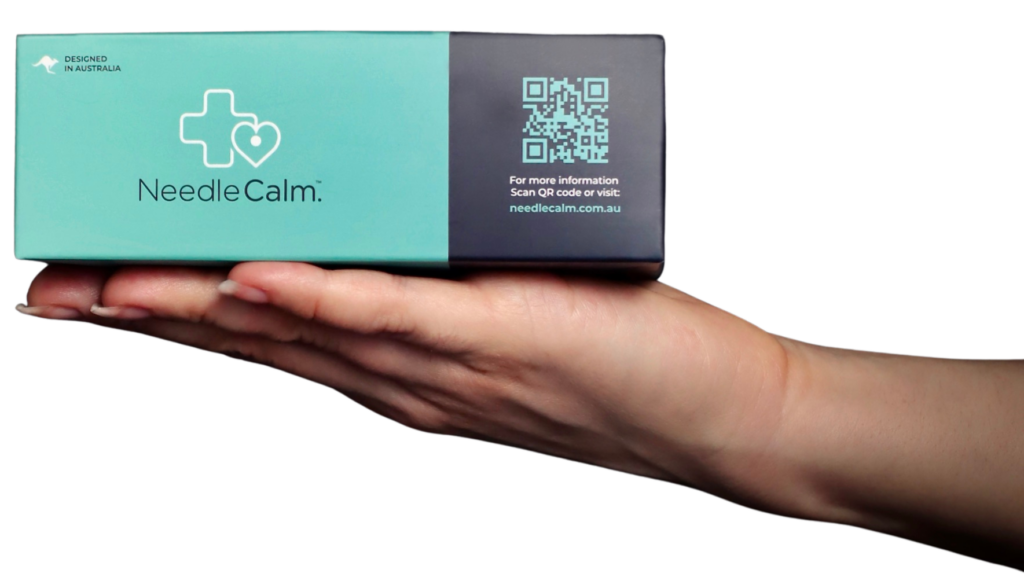 NeedleCalm box of 7 needle anxiety pads held in hand — Australian designed medical device